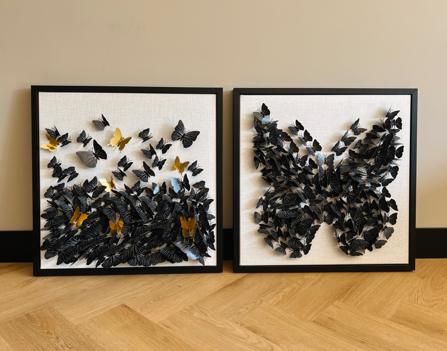Twee wanddecoraties met vlinders